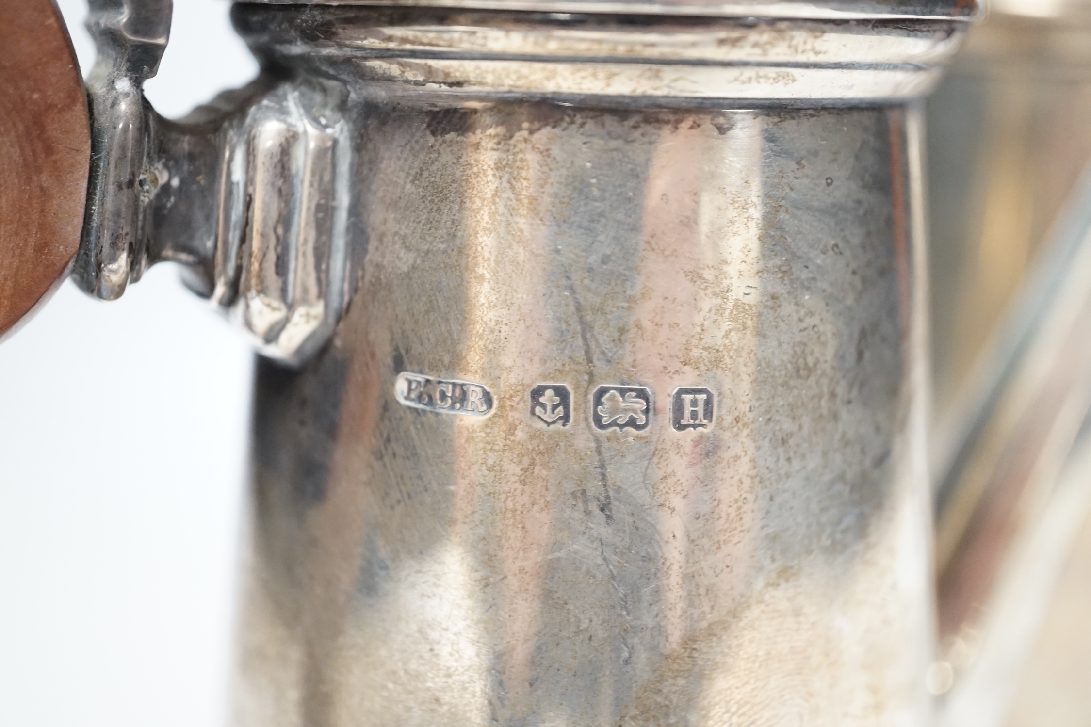 A George V silver cafe au lait pair, by F.C. Richards, Birmingham, 1932, height 19.7cm, gross weight 25.5oz.